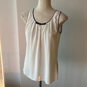 White semi sheer Le Chateau tank with black piping size small
